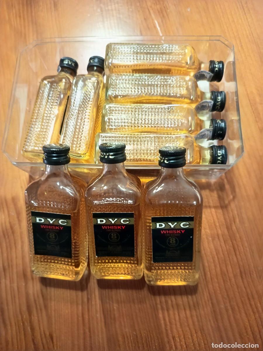 Coleccionismo de vinos y licores: 9 botellitas de Whisky DYC antiguas 8 a&ntilde;os