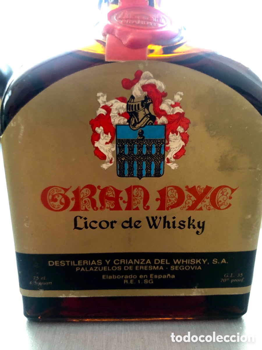 Collection of wines and liquors: Antigua Botella Gran DYC Licor de Whisky - A&ntilde;os 70/80 - Precinto 8 Pesetas - Sin Abrir / Lleno