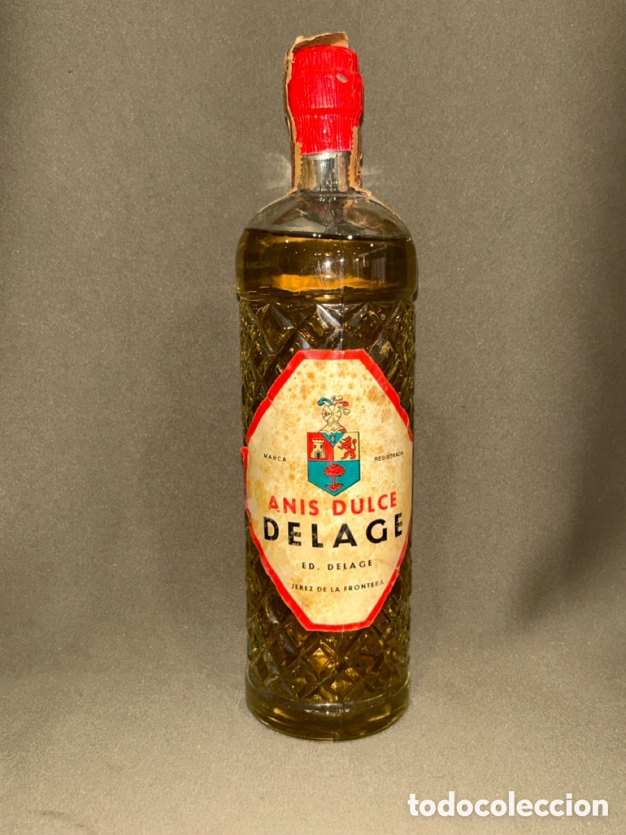 Coleccionismo de vinos y licores: ANTIGUA BOTELLA DE LICOR DE ANIS DULCE DELAGE ED.DELAGE, JEREZ DE LA FRONTERA *SIN ABRIR* *LLENA*