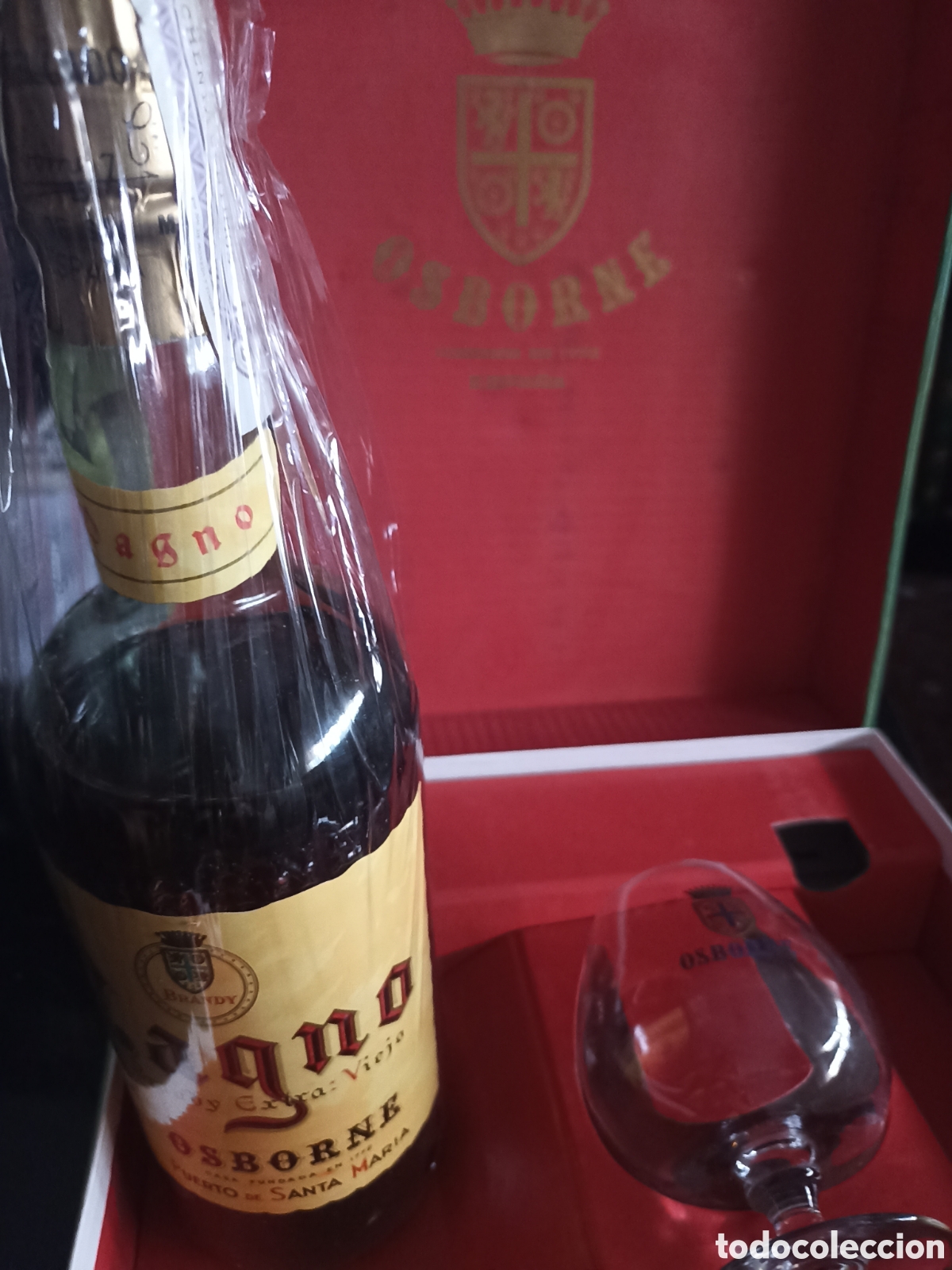 Coleccionismo de vinos y licores: Antigua botella brandy Magno extra viejo de Osborne a&ntilde;os 60