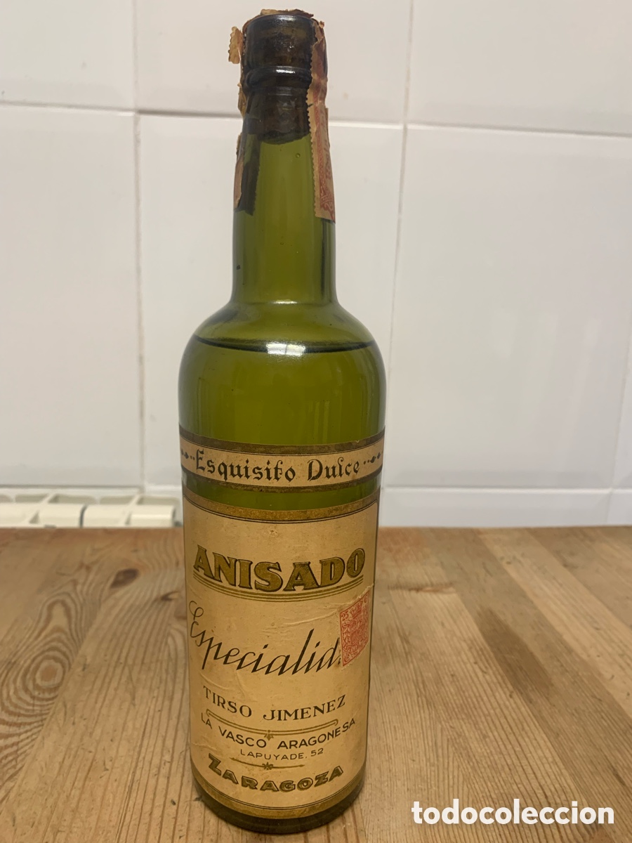 Coleccionismo de vinos y licores: Botella de anisado Tirso Jimenez, la vasco aragonesa, Zaragoza