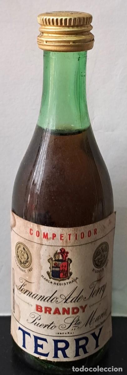 Coleccionismo de vinos y licores: BOTELLIN COMPETIDOR BRANDY TERRY, PUERTO DE SANTA MARIA. PRECINTADO. RF-6587