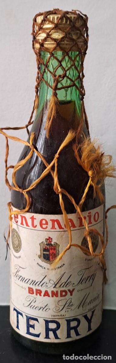 Coleccionismo de vinos y licores: BOTELLIN BRANDY CENTENARIO TERRY. PRECINTADO. RF-6591