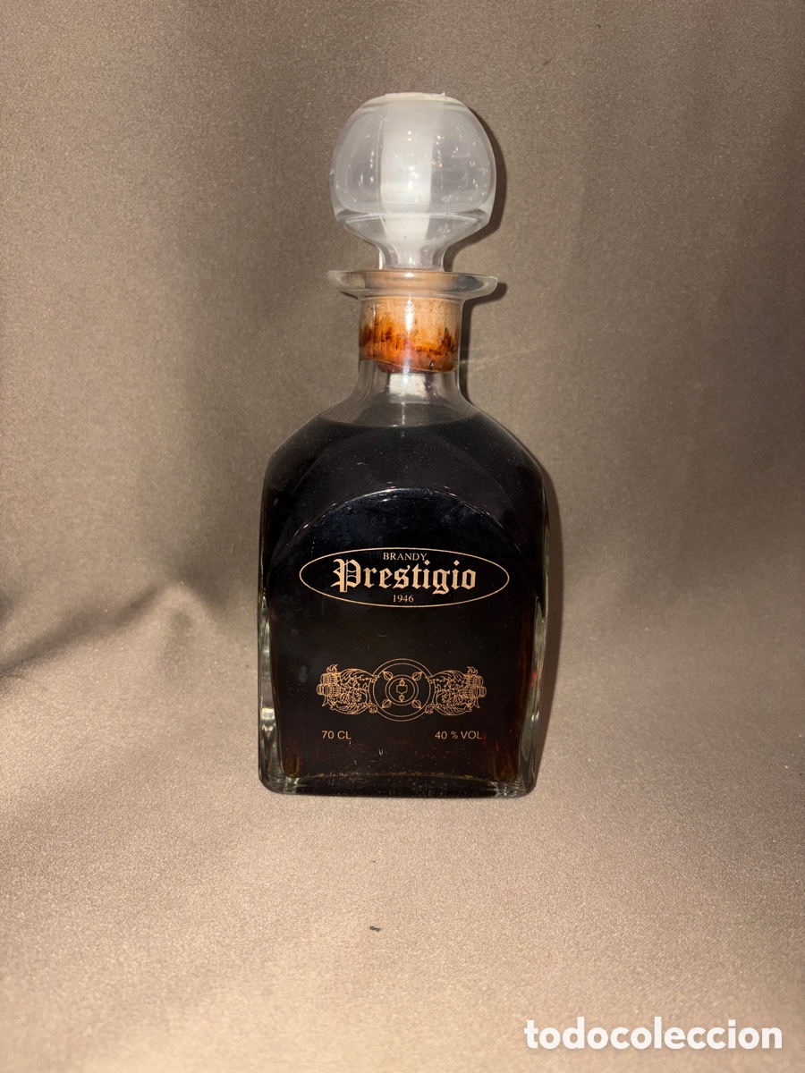 Coleccionismo de vinos y licores: Antigua botella brandy prestigio-NUMERADA 255-Sin abrir*VER FOTOS