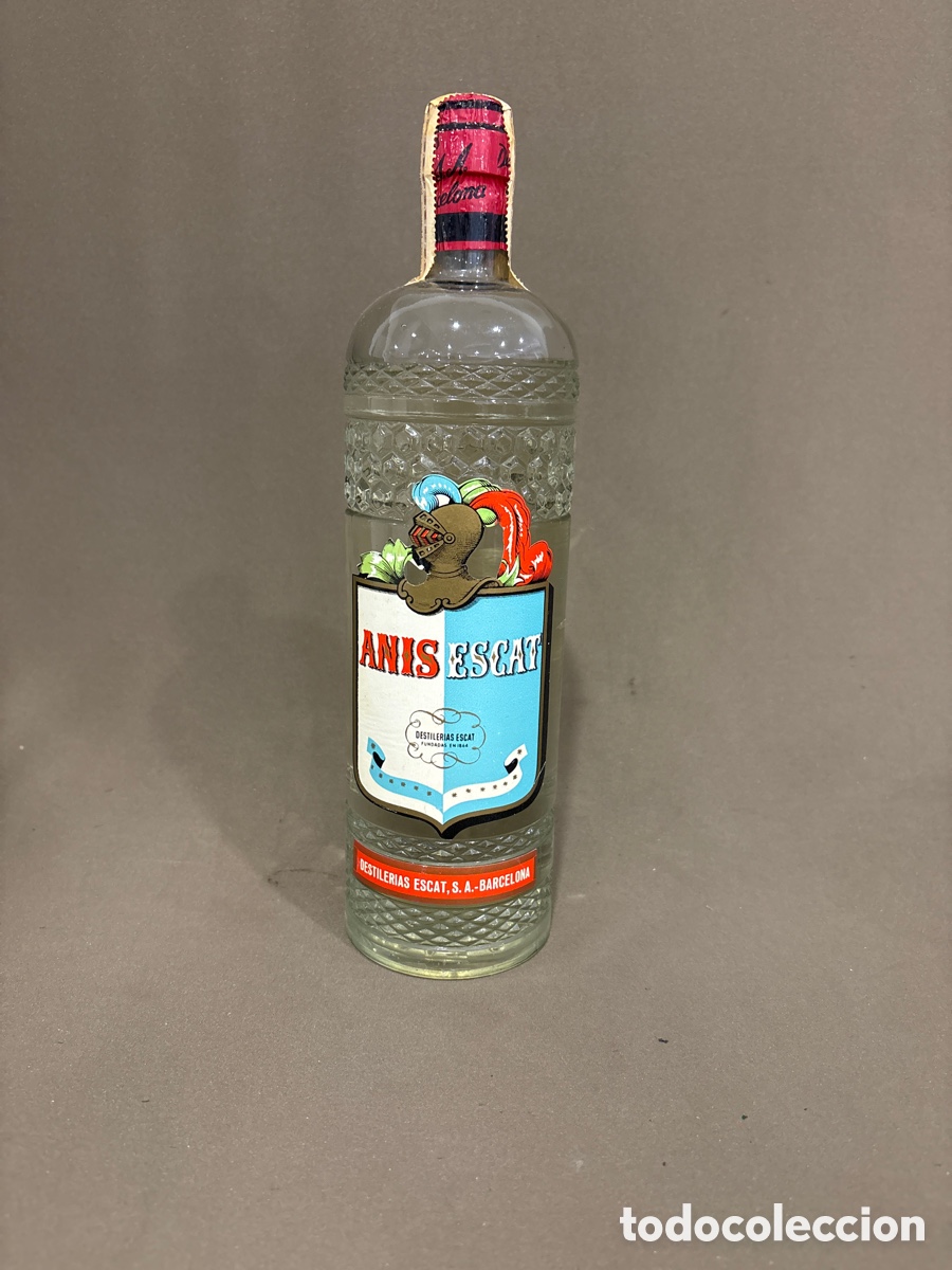 Coleccionismo de vinos y licores: Antigua botella de AN&Iacute;S ESCAT,llena y precintada*ver fotos*barcelona,sello 4 ptas.