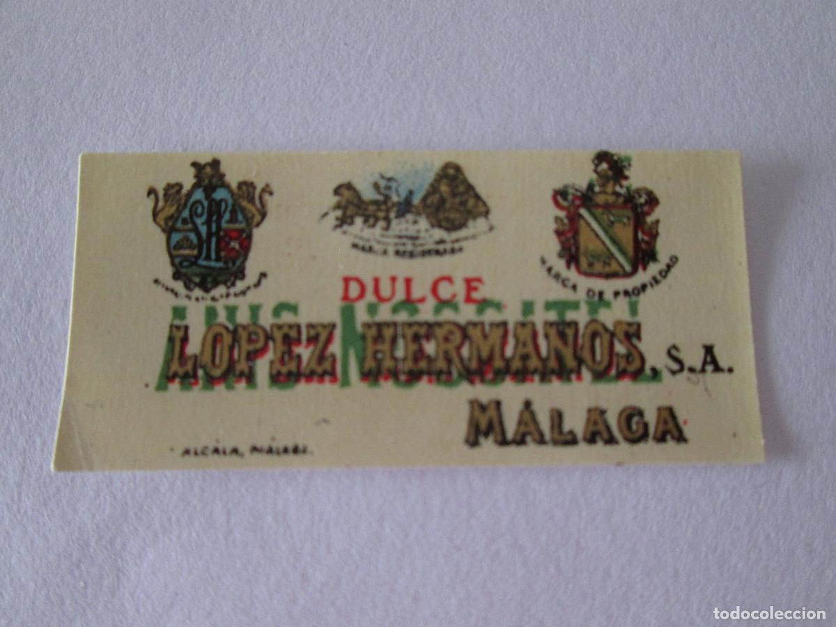 Coleccionismo de vinos y licores: ETIQUETA MINIATURA - ANIS DULCE - LOPEZ HERMANOS - MALAGA - 2,3X5CM- SIN USAR