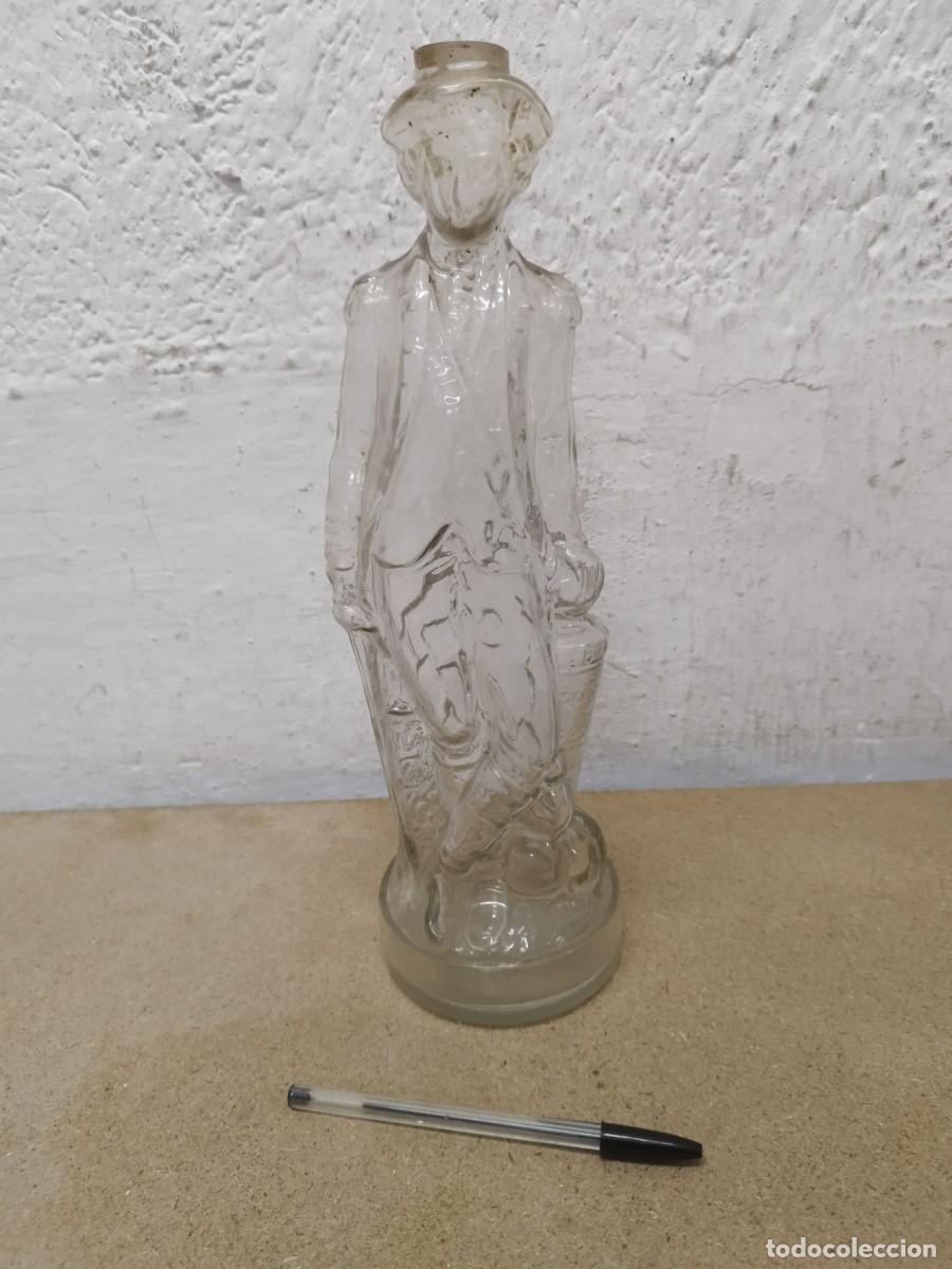 Collection of wines and liquors: Antigua botella de vidrio figura de hombre con sombrero y vestimenta del siglo XIX. Gal&aacute;n. Depose.