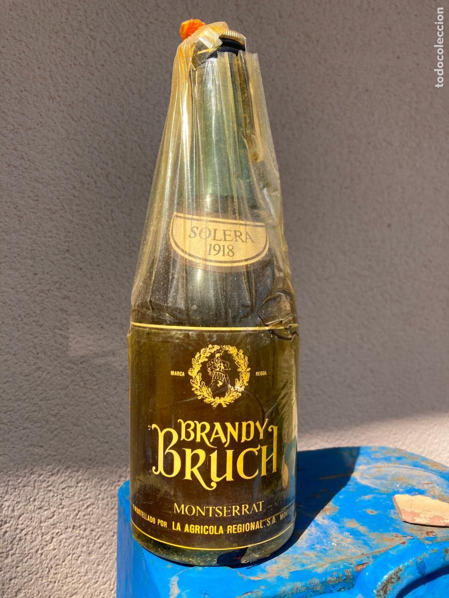 Coleccionismo de vinos y licores: Botella Brandy Bruch, Solera 1918. Precinto 4 pesetas