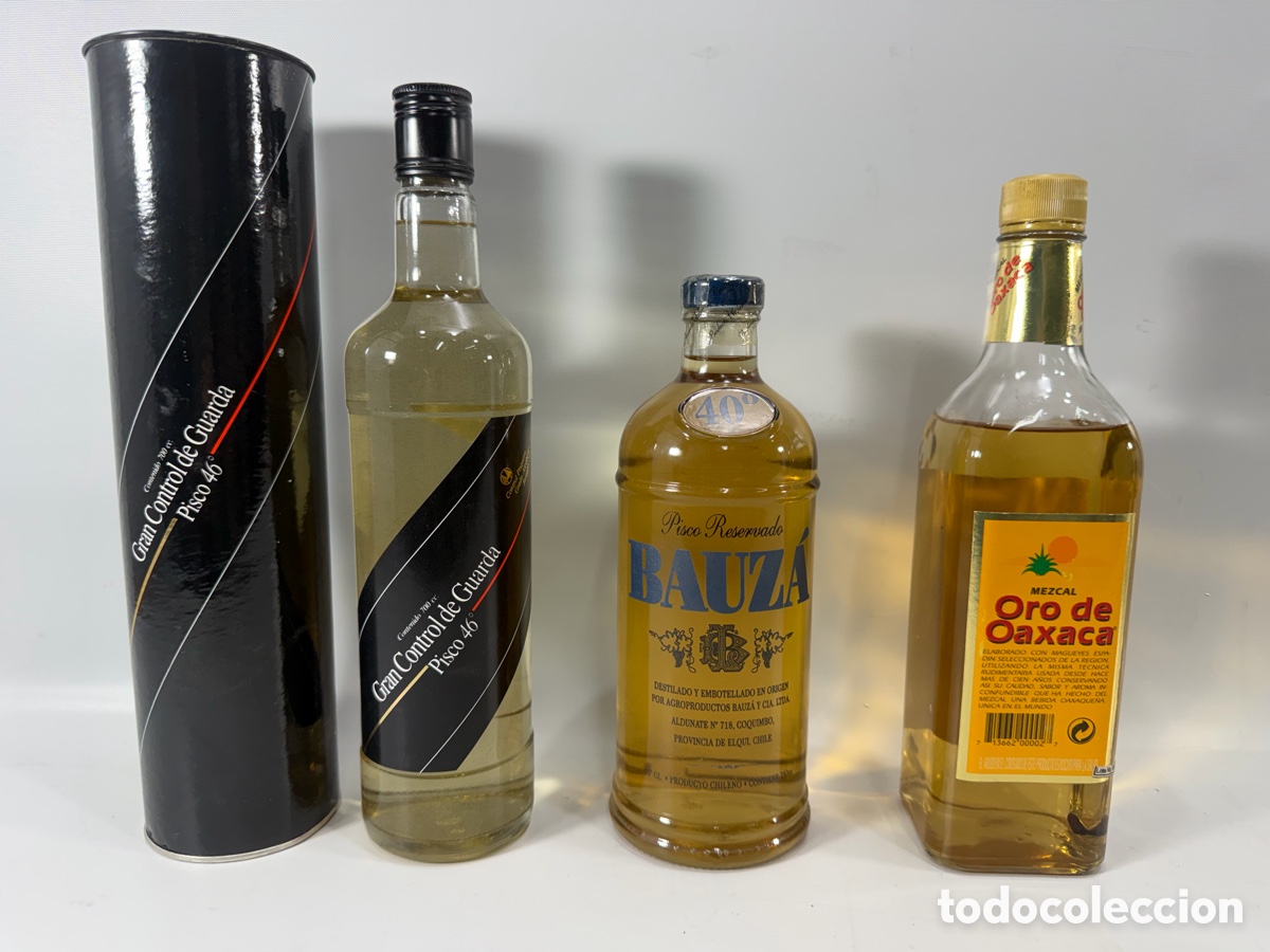 Sammlung von Weinen und Lik&ouml;ren: LOTE 3 BOTELLAS ANTIGUAS &ndash; PISCO BAUZ&Aacute;, GRAN CONTROL DE GUARDA Y MEZCAL ORO DE OAXACA