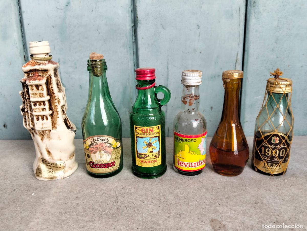Collectionnisme de vins et liqueurs: Lote botellines de licor antiguos vac&iacute;os o a medias terry gin mahon germanor lenanten generoso
