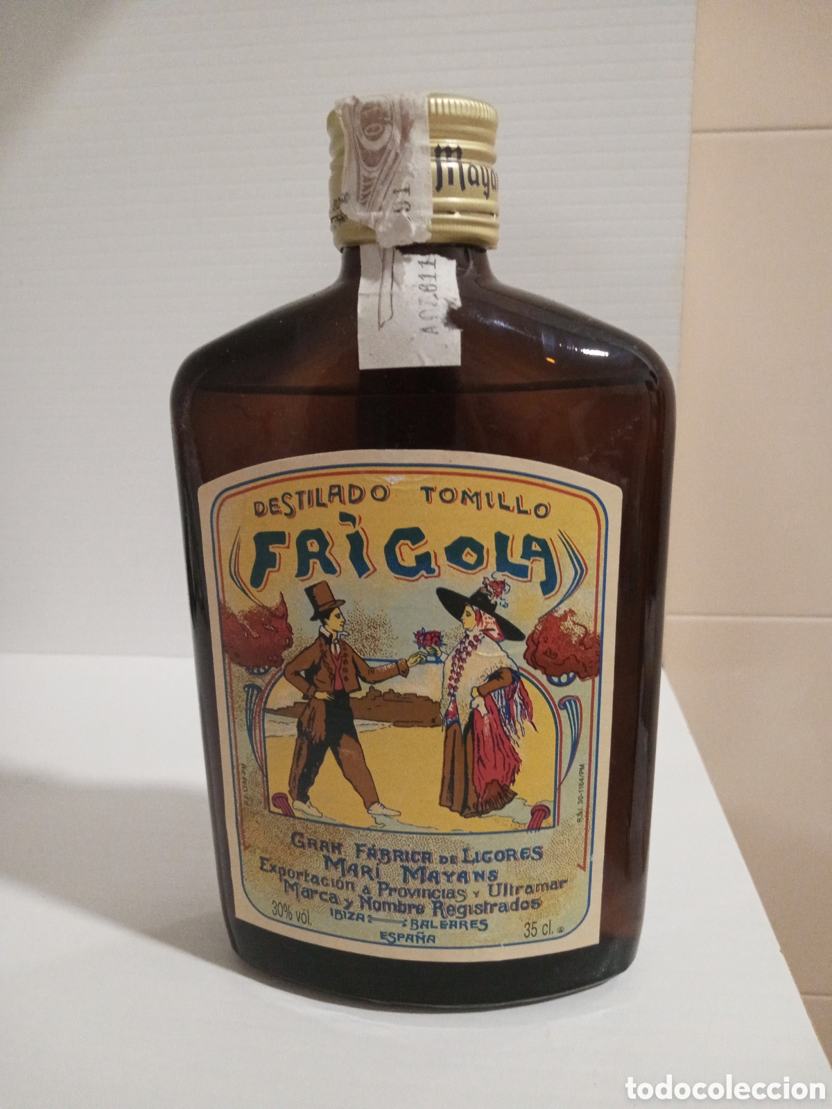 Coleccionismo de vinos y licores: Botella Frigola destilado tomillo 35 cl