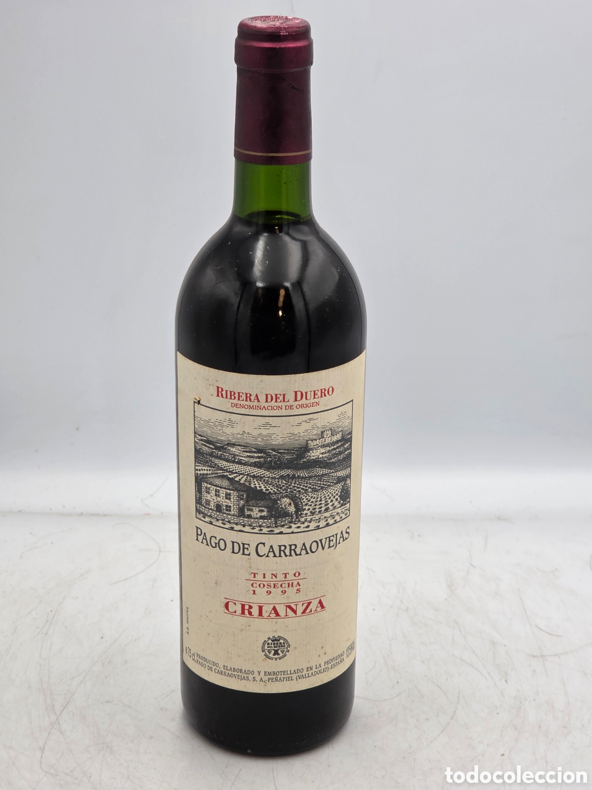 Collection of wines and liquors: BOTELLA VINO TINTO PAGO DE CARROVEJAS CRIANZA 1995