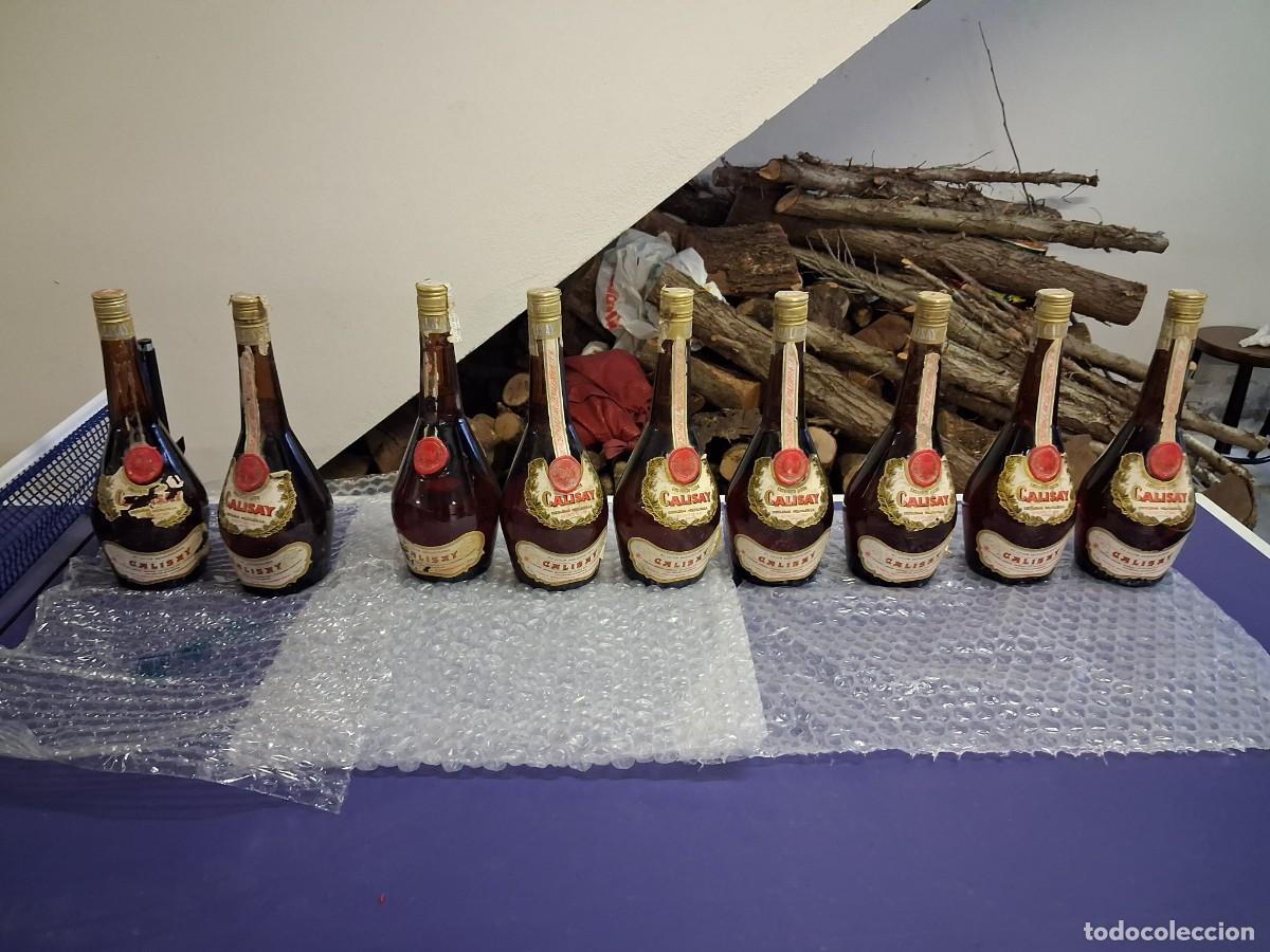 Coleccionismo de vinos y licores: 9 botellas licor Calisay Destilerias Mollfulleda - 1 litro - 33%