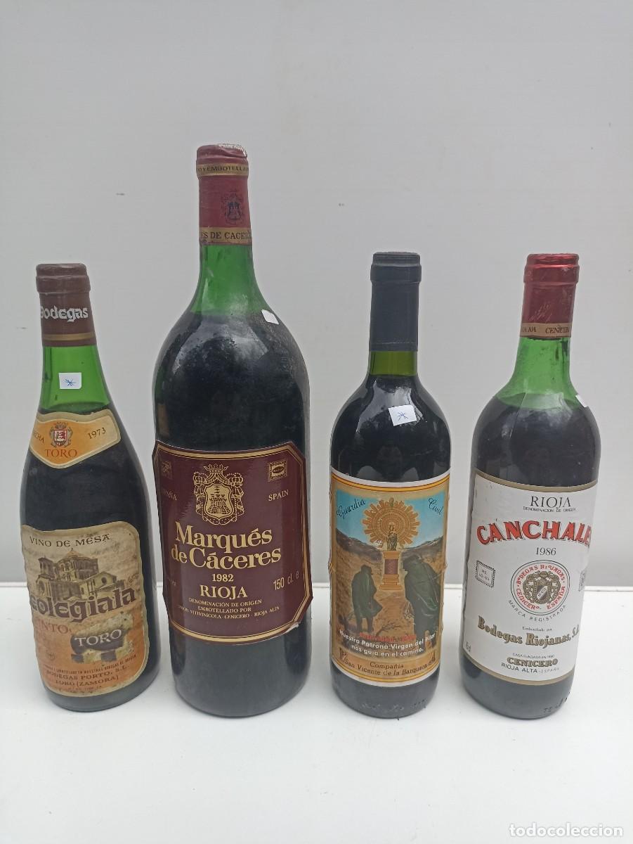 Collectionnisme de vins et liqueurs: Lote 4 botellas de vino 1973 Colegiala, 1982 Marqu&eacute;s de C&aacute;ceres, 1986 Canchales, Guardia Civil