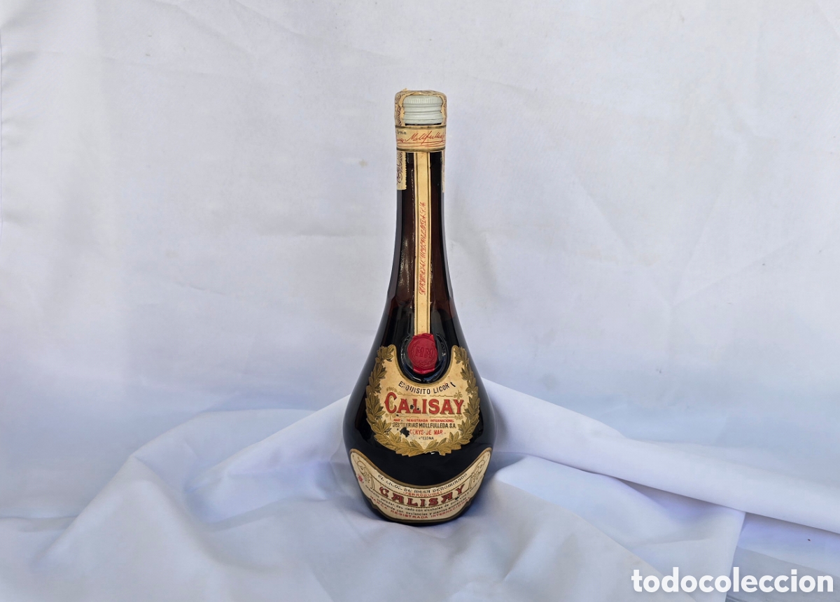 Coleccionismo de vinos y licores: ANTIGUA BOTELLA CALISAY LLENA. DESTILERIAS MOLLFULLEDA S.A. BARCELONA. CON SELLO OCHENTA CENTIMOS
