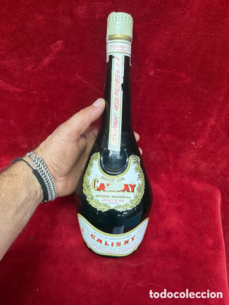Coleccionismo de vinos y licores: Antigua botella de licor Calisay sin abrir,de 1 litro!