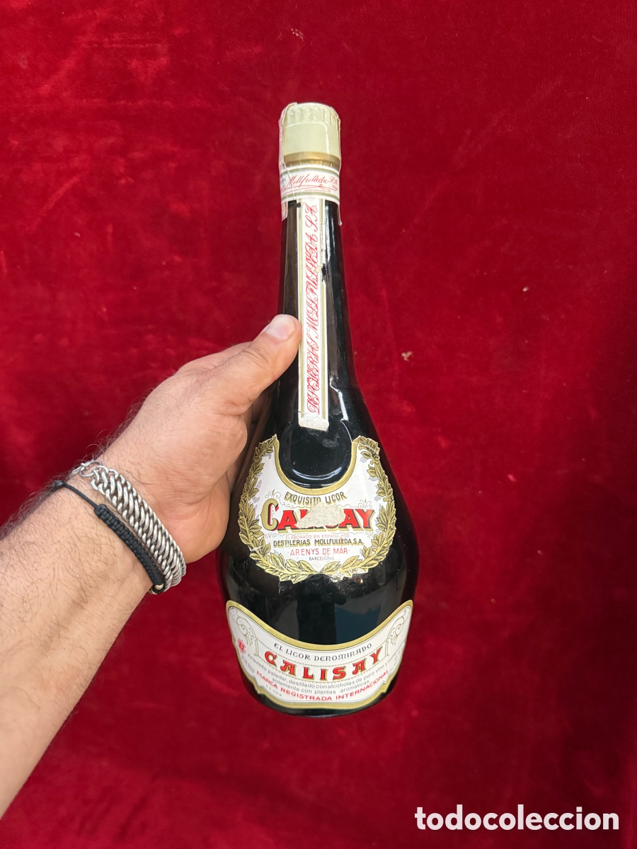 Coleccionismo de vinos y licores: Antigua botella de licor Calisay sin abrir,de 1 litro!