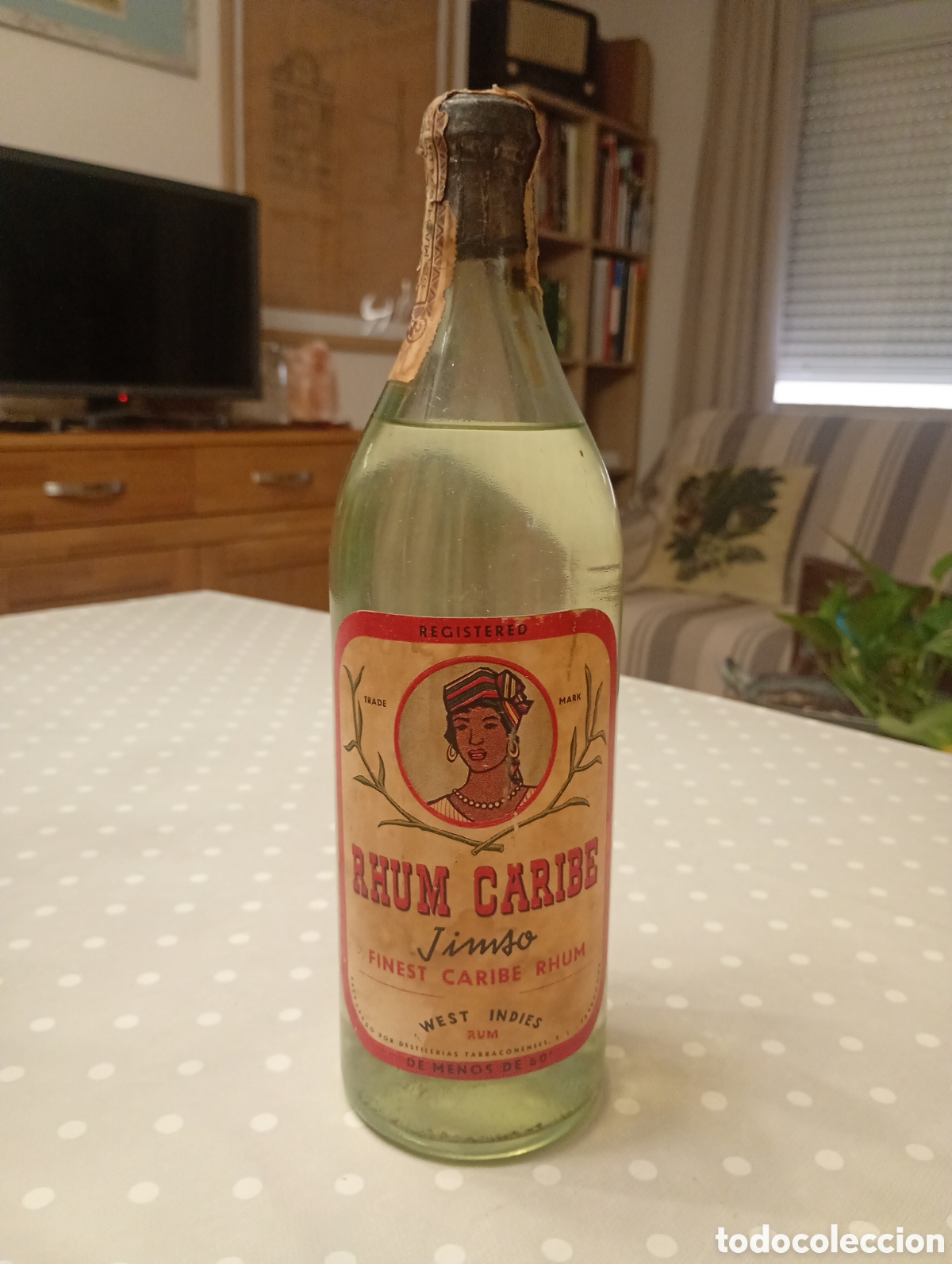 Coleccionismo de vinos y licores: Ron, Rhum Caribe Jimso. Destilerias Tarraconenses SA, Tarragona. 80 c&eacute;ntimos. A&ntilde;os 50