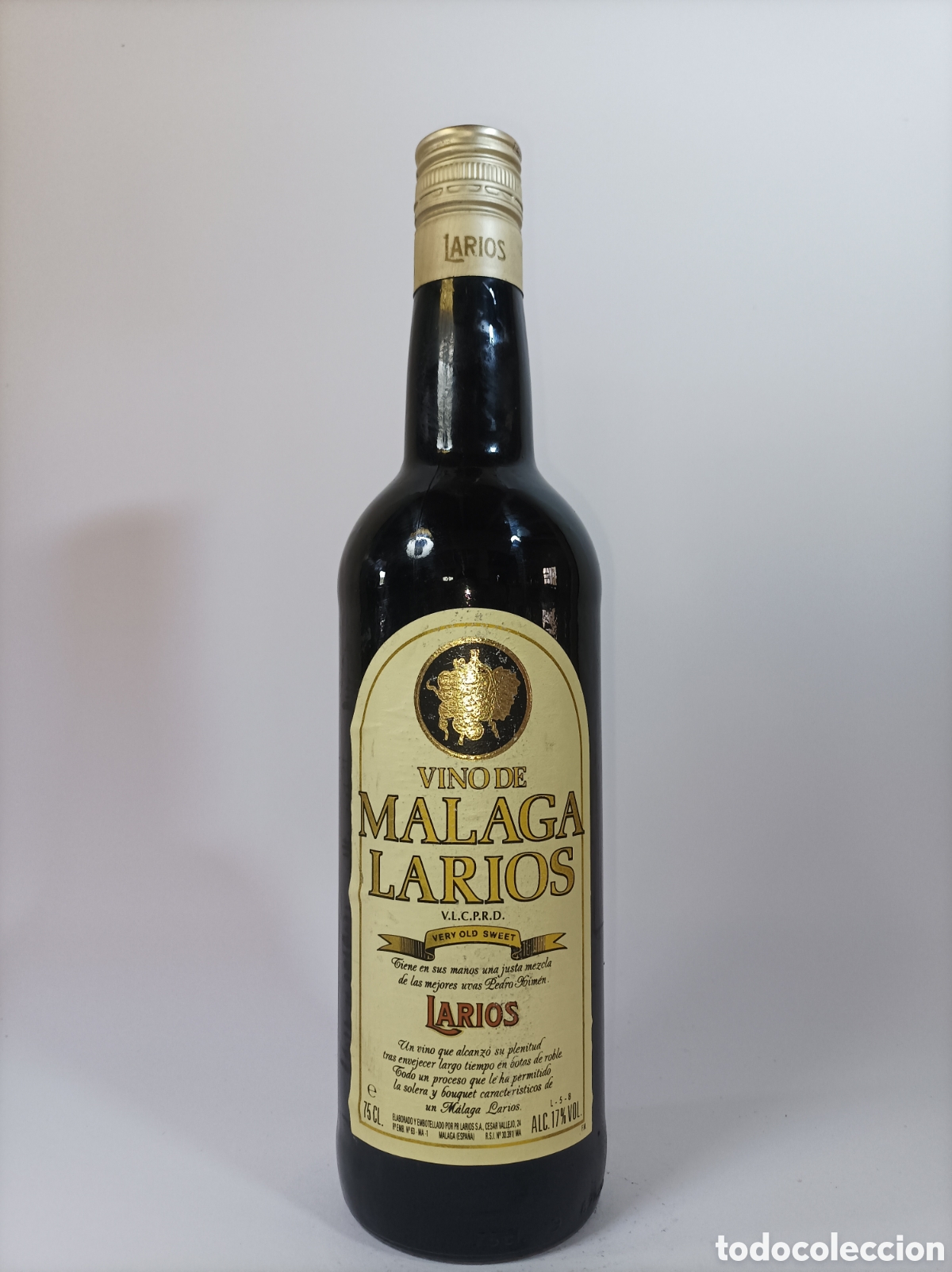 Coleccionismo de vinos y licores: VINO DE M&Aacute;LAGA LARIOS. 75 CL. BOTELLA ANTIGUA LICOR.