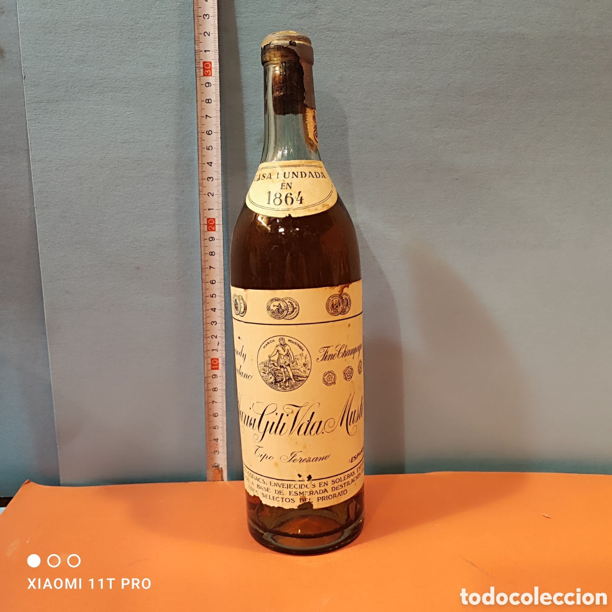 Coleccionismo de vinos y licores: Botella de brandy, co&ntilde;ac fine champagne Mar&iacute;a Gili vda Must&eacute;. Reus
