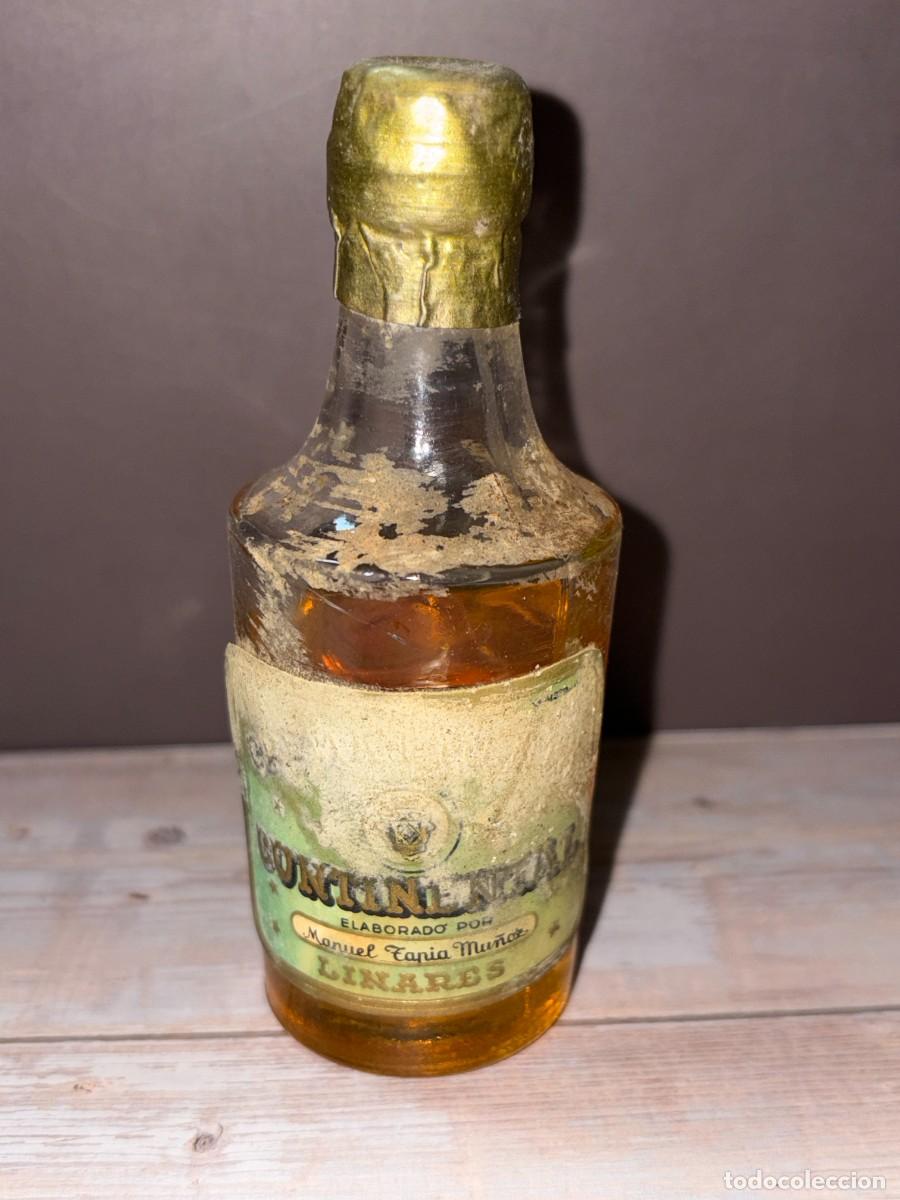 Collection of wines and liquors: BOTELL&Iacute;N. CREMA DE VAINILLA? CONTINENTAL. MANUEL TAPIA MU&Ntilde;OZ. LINARES