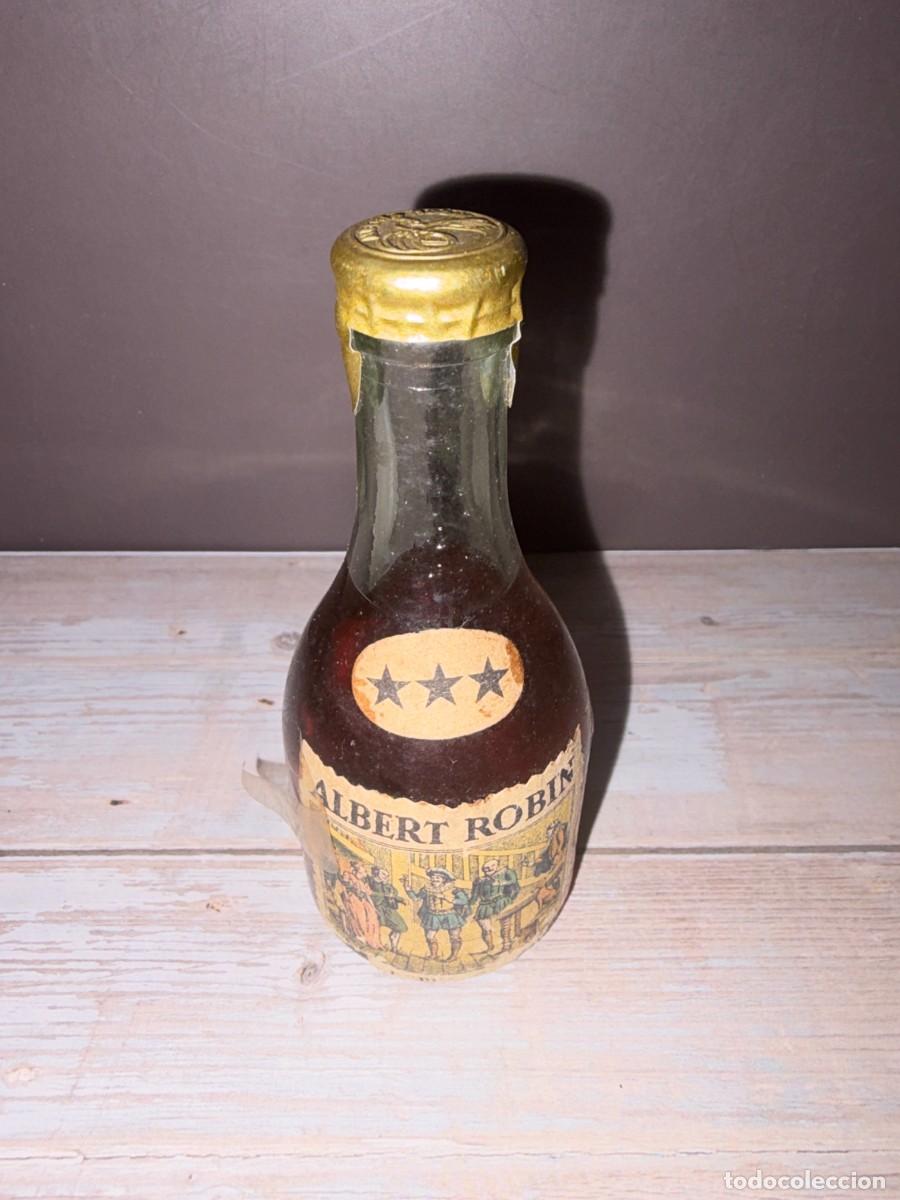 Collection of wines and liquors: BOTELL&Iacute;N. COGNAC. ALBERT ROBIN