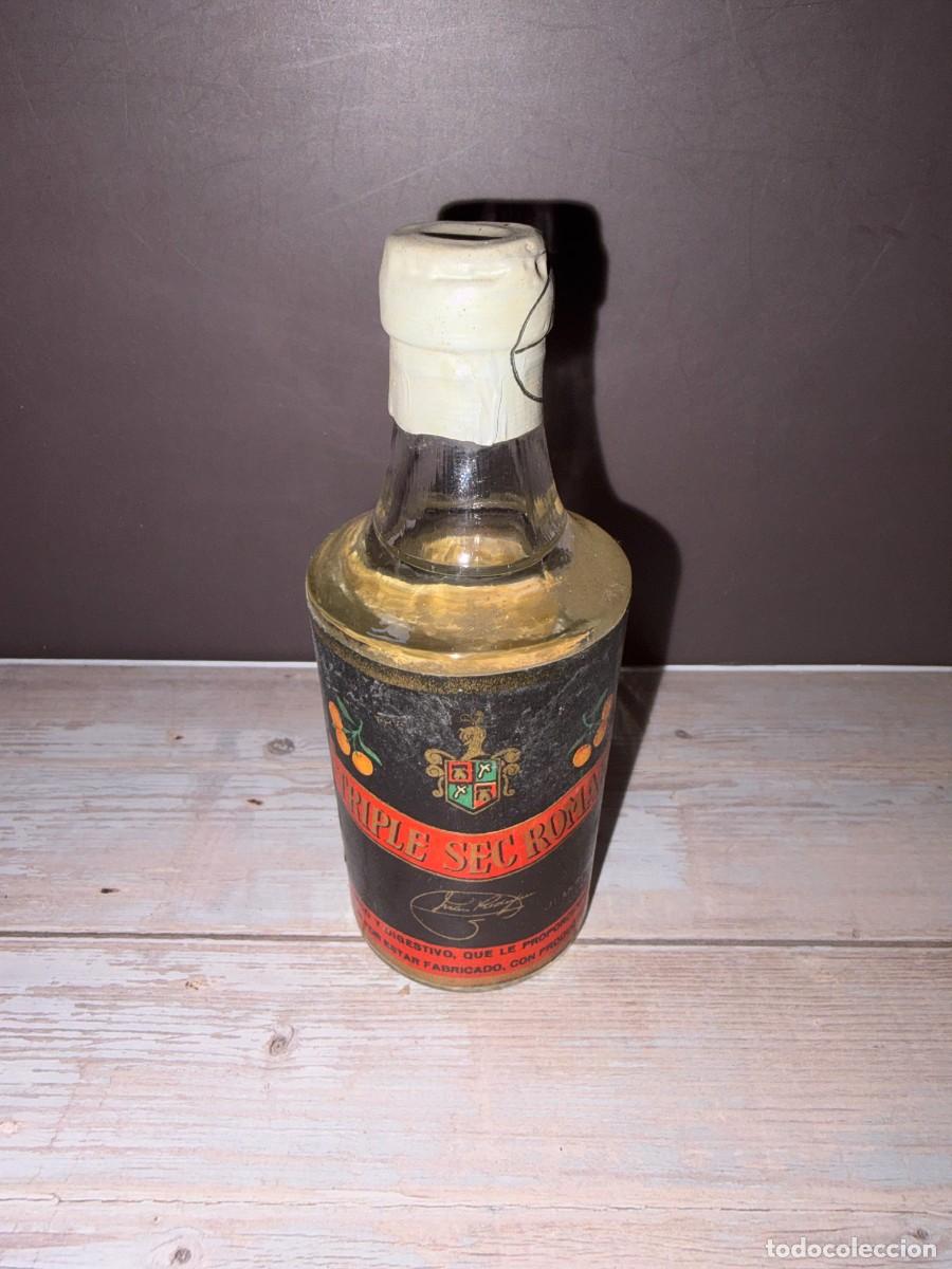 Coleccionismo de vinos y licores: BOTELL&Iacute;N. TRIPLE SEC ROMAR. JUAN RODRIGUEZ. LINARES.