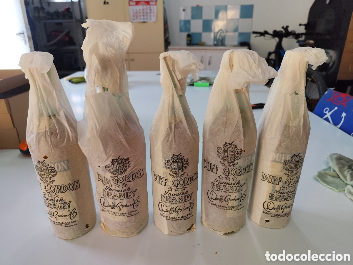 Coleccionismo de vinos y licores: 5 Botellas antiguas Brandy Duff Gordon 1 Litro &ndash; Envoltorio Original &ndash; 4 Pesetas