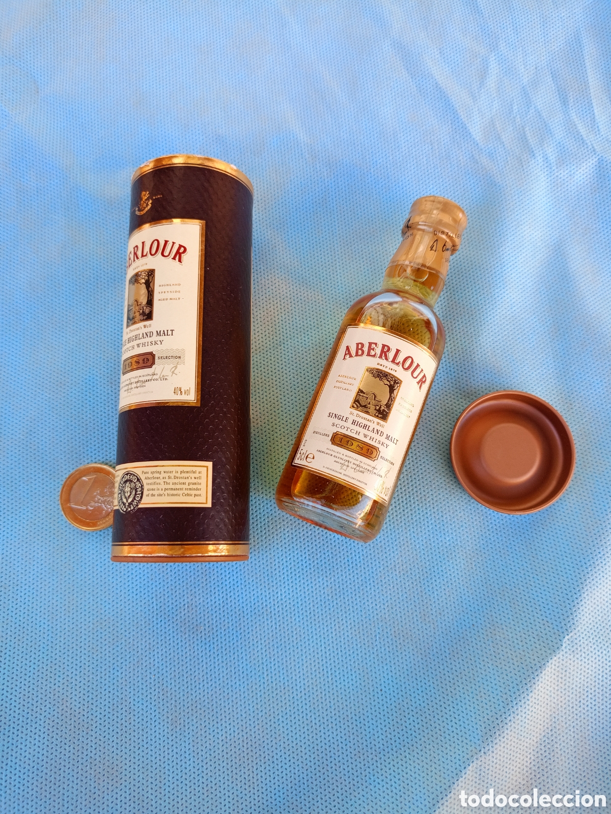 Coleccionismo de vinos y licores: PEQUE&Ntilde;A BOTELLA DE WHISKY DE MALTA