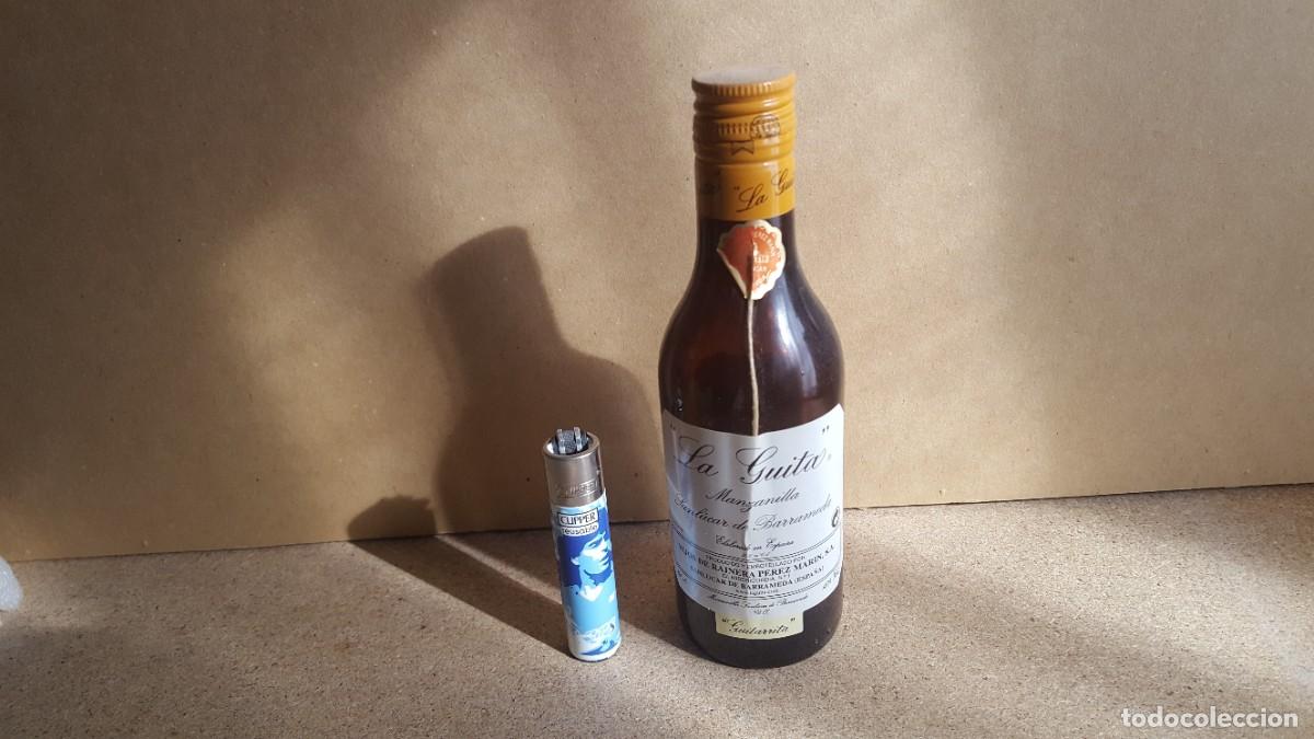 Coleccionismo de vinos y licores: Botella/botell&iacute;n/botellita manzanilla La Guita. 20cl. Vac&iacute;a.