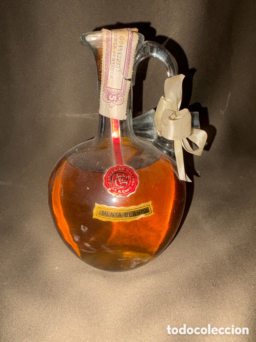 Sammlung von Weinen und Lik&ouml;ren: Antigua botella MENTA BLANCA*destilerias galiana*ALICANTE,PRECINTADA*SIN ABRIR*