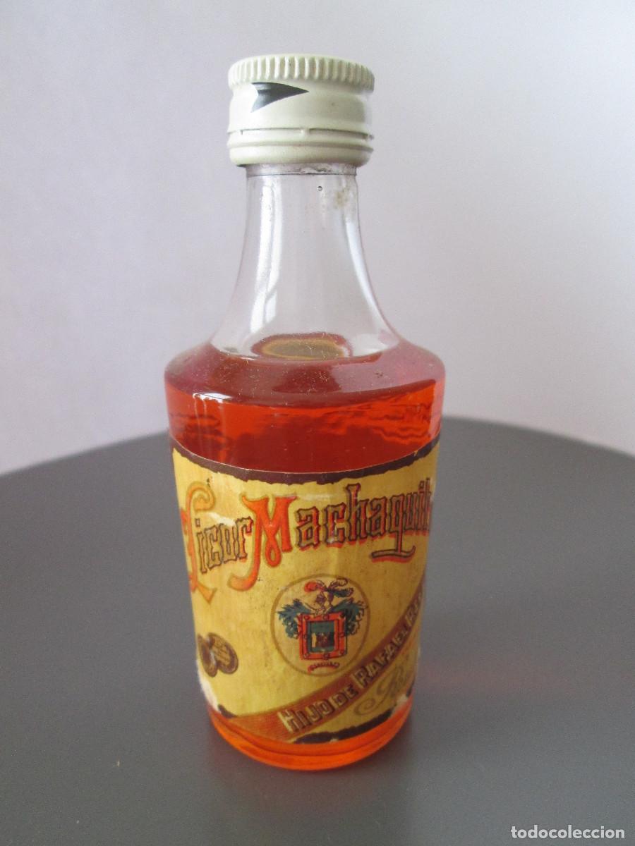 Coleccionismo de vinos y licores: BOTELLIN MINIATURA LICOR - LICOR MACHAQUITO - RUTE - LLENA