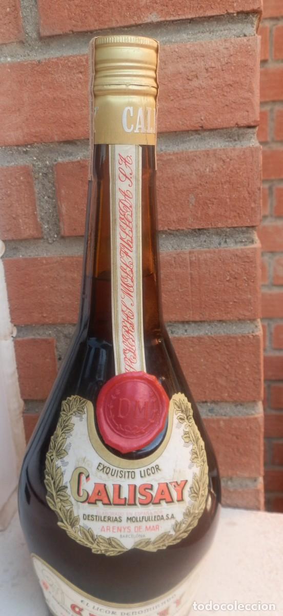 Colecionismo de vinhos e licores: Botella Licor Calisay, Destilerias Mollfulleda Arenys de Mar. Precintada. Etiqueta de 4 ptas 1 Litro