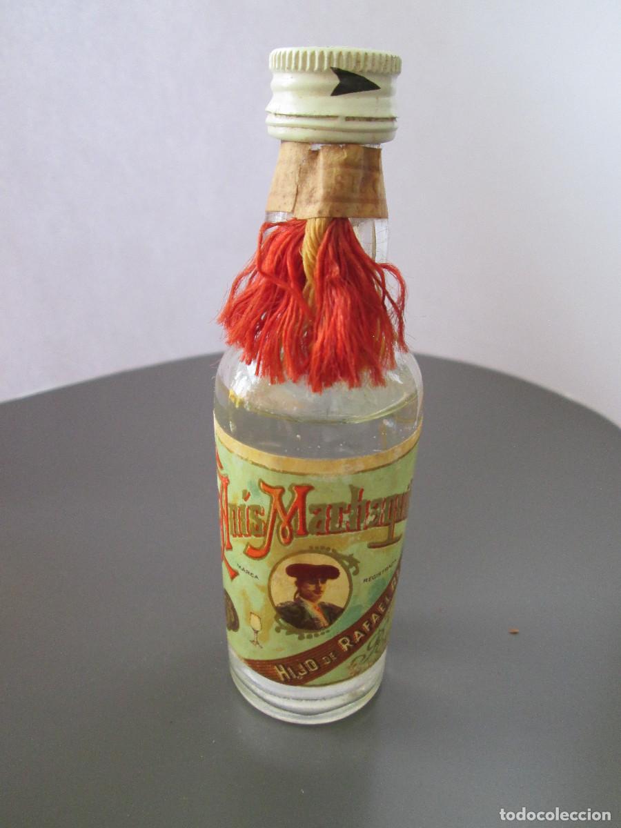 Coleccionismo de vinos y licores: BOTELLIN MINIATURA LICOR - ANIS MACHAQUITO - RUTE - CASI LLENA