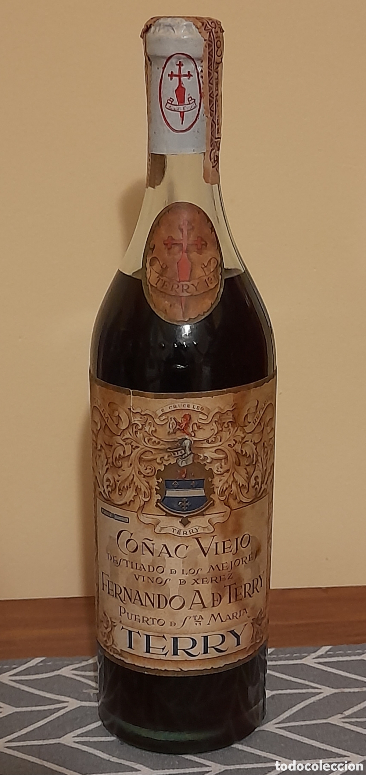 Collezionismo di vini e liquori: Antigua botella de co&ntilde;ac, Fernando AD Terry, Puerto de Santa Marta