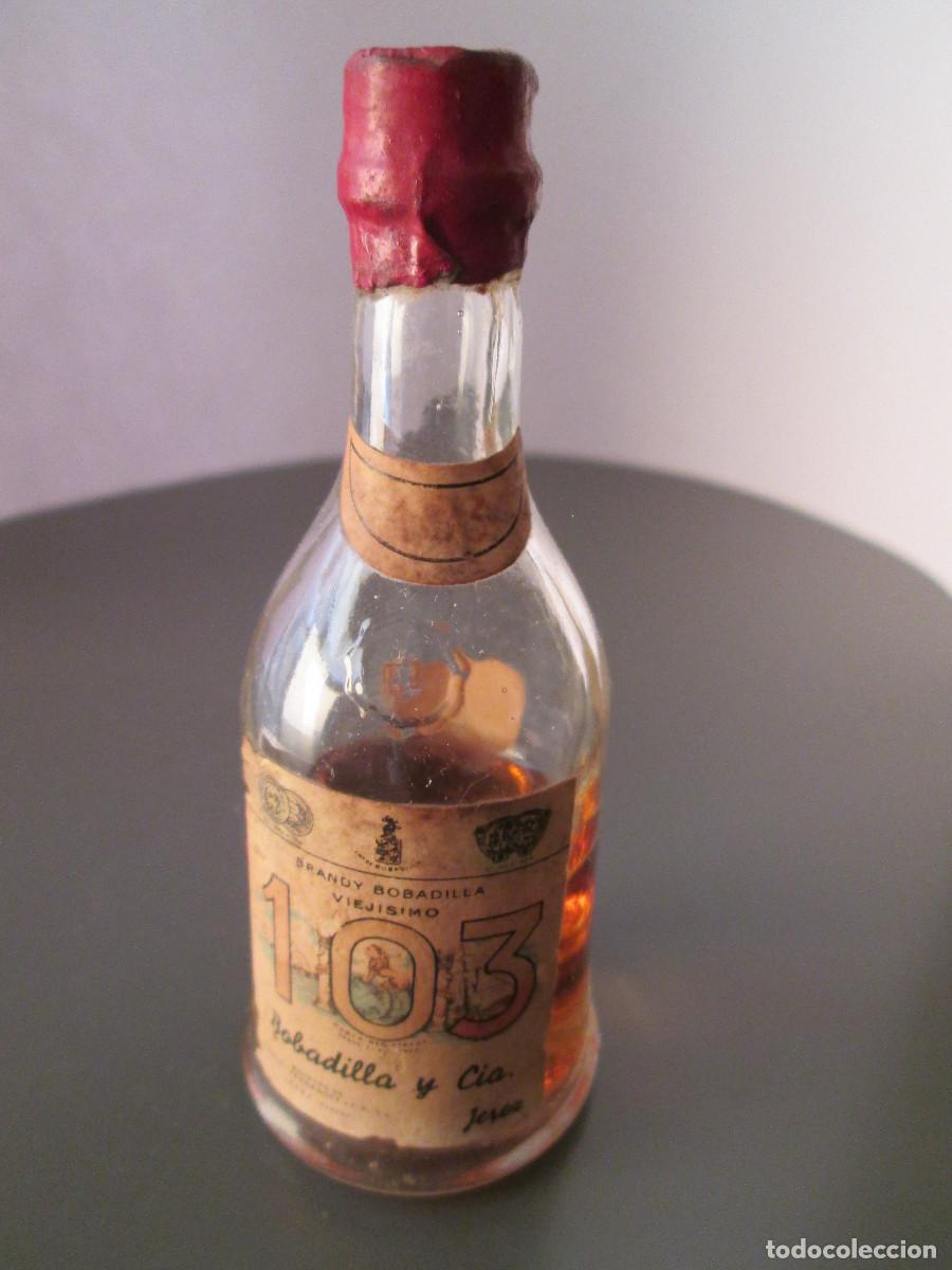 Coleccionismo de vinos y licores: BOTELLIN MINIATURA LICOR - BRANDY BOBADILLA VIEJISIMO 103 - MEDIA
