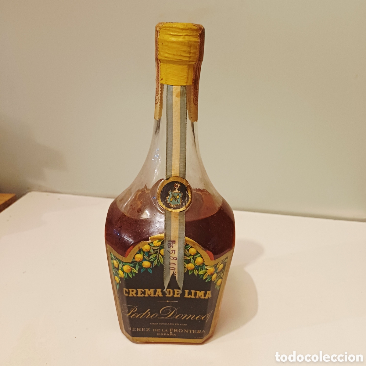 Collezionismo di vini e liquori: Botella de licor Crema de Lima Pedro Domecq precintada con evaporacion jerez de la frontera