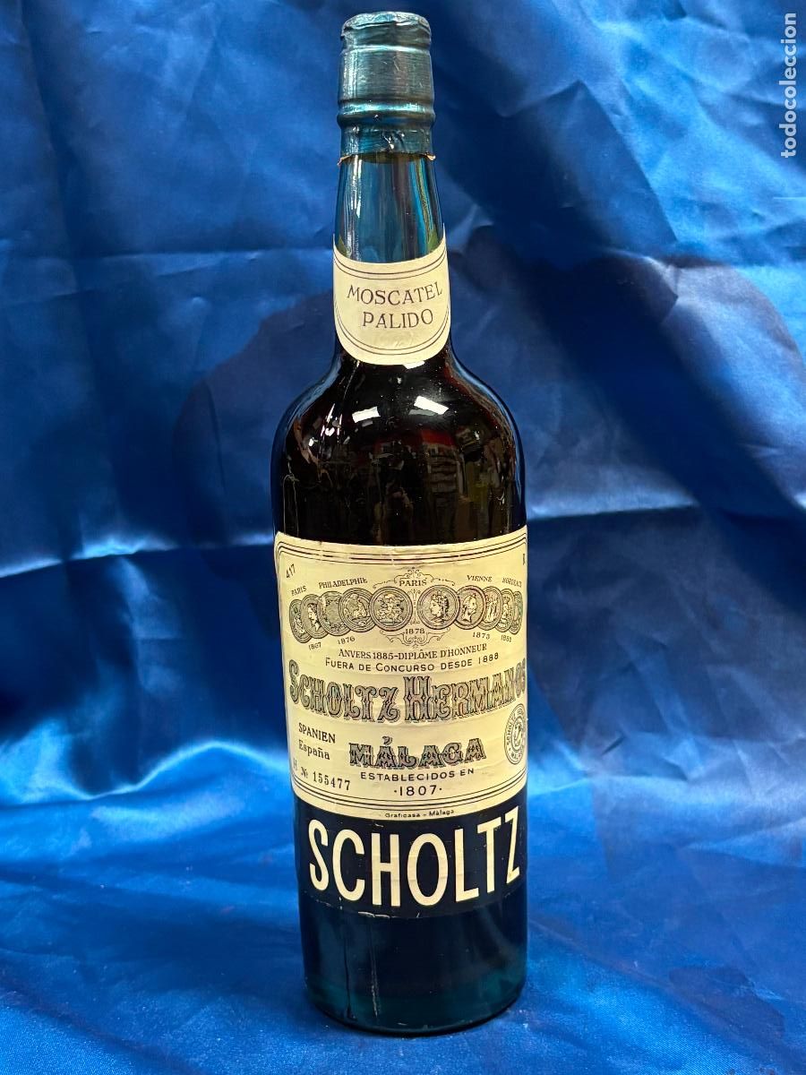 Sammlung von Weinen und Lik&ouml;ren: Botella de vino Scholtz Malaga moscatel palido - precintada nueva