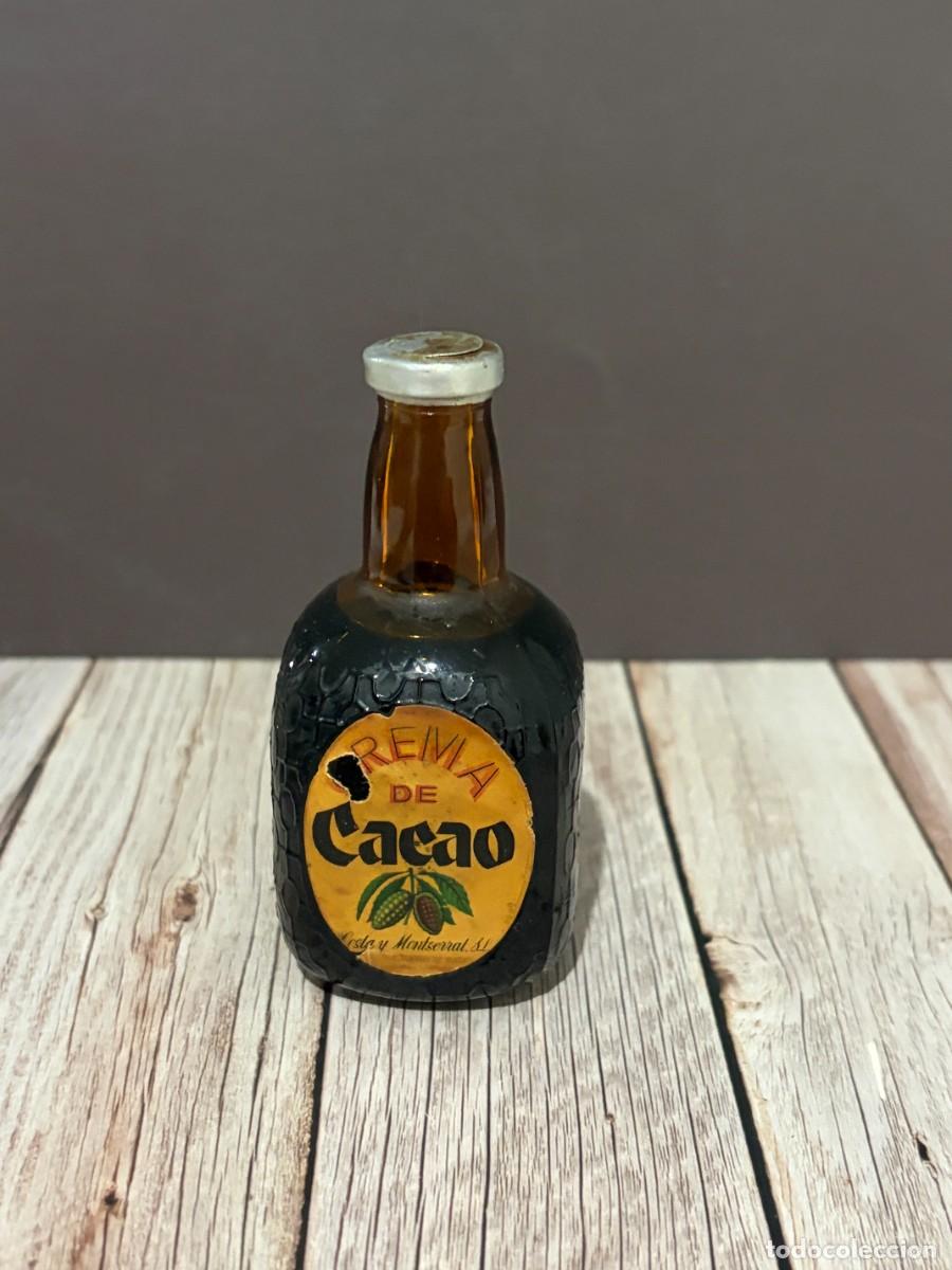 Coleccionismo de vinos y licores: BOTELL&Iacute;N DE LICOR REINA DE CACAO. DESTILER&Iacute;AS VELA Y MONTSERRAT.