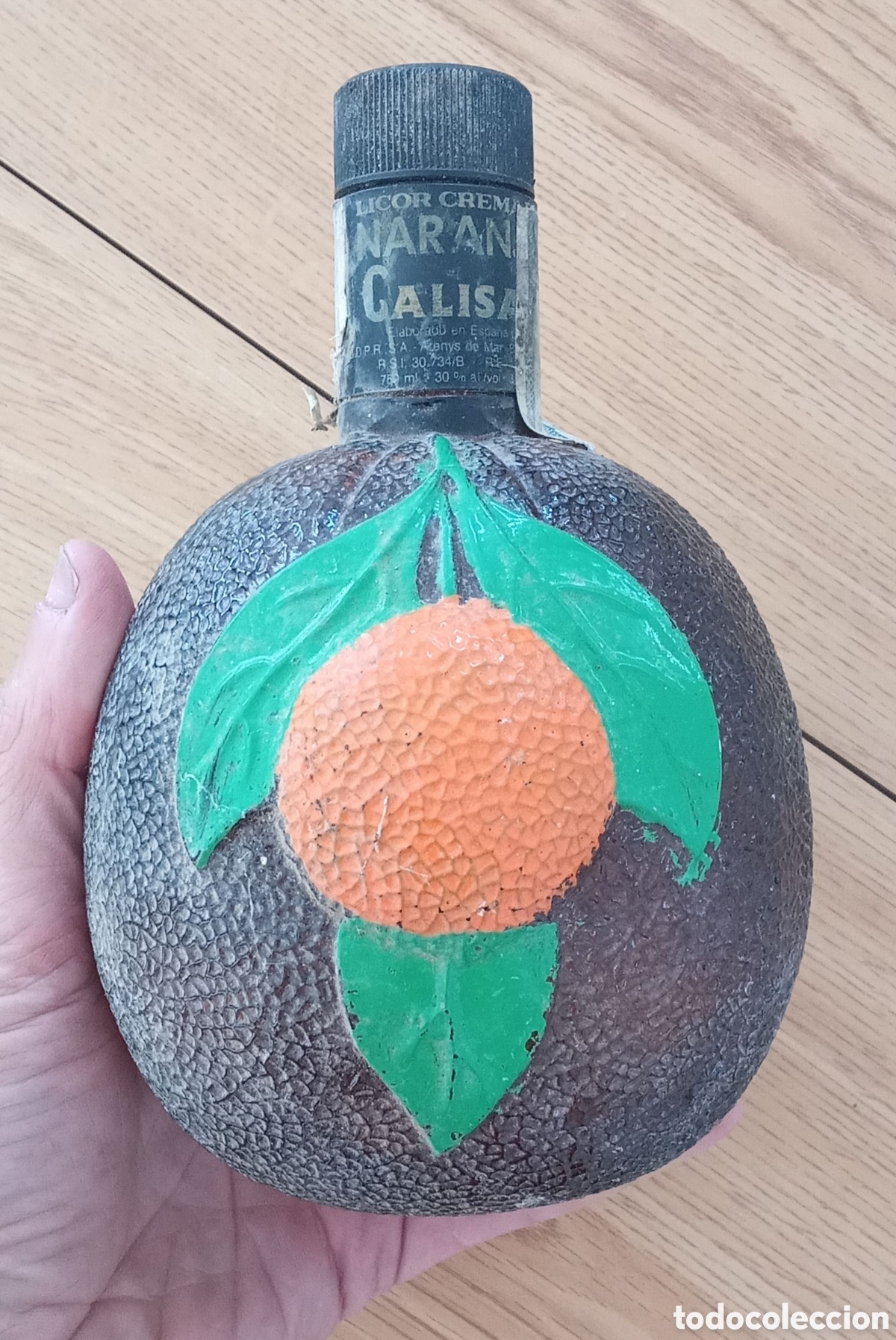 Collection of wines and liquors: Botella de CALISAY NARANJA (vac&iacute;a). MOLLFULLEDA. Cristal. Sin limpiar.