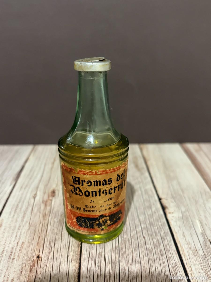 Coleccionismo de vinos y licores: BOTELLA ANTIGUA DE AROMAS DEL MONTSERRAT. LICOR DE HIERBAS.