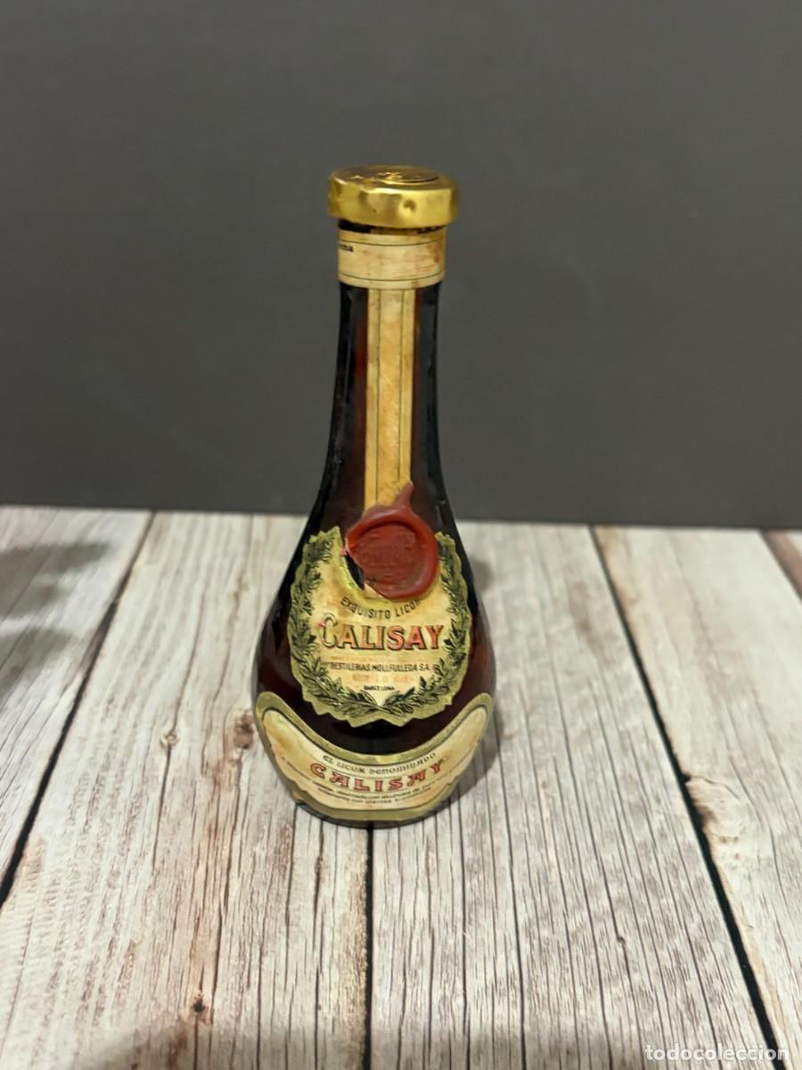 Coleccionismo de vinos y licores: BOTELLIN CALISAY EXQUISITO LICOR - DESTILERIAS MOLLFULLEDA BARCELONA