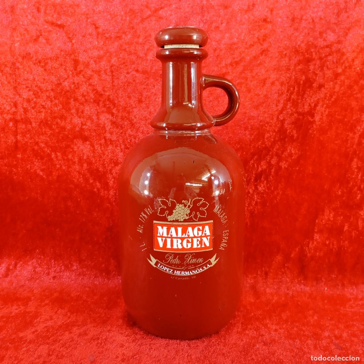 Coleccionismo de vinos y licores: CL&Aacute;SICA BOTELLA DE VIDRIO - VINO DULCE DE MALAGA - PERO XIM&Eacute;NEZ - 1L - ESPA&Ntilde;A - 23,5 CM DE ALTO