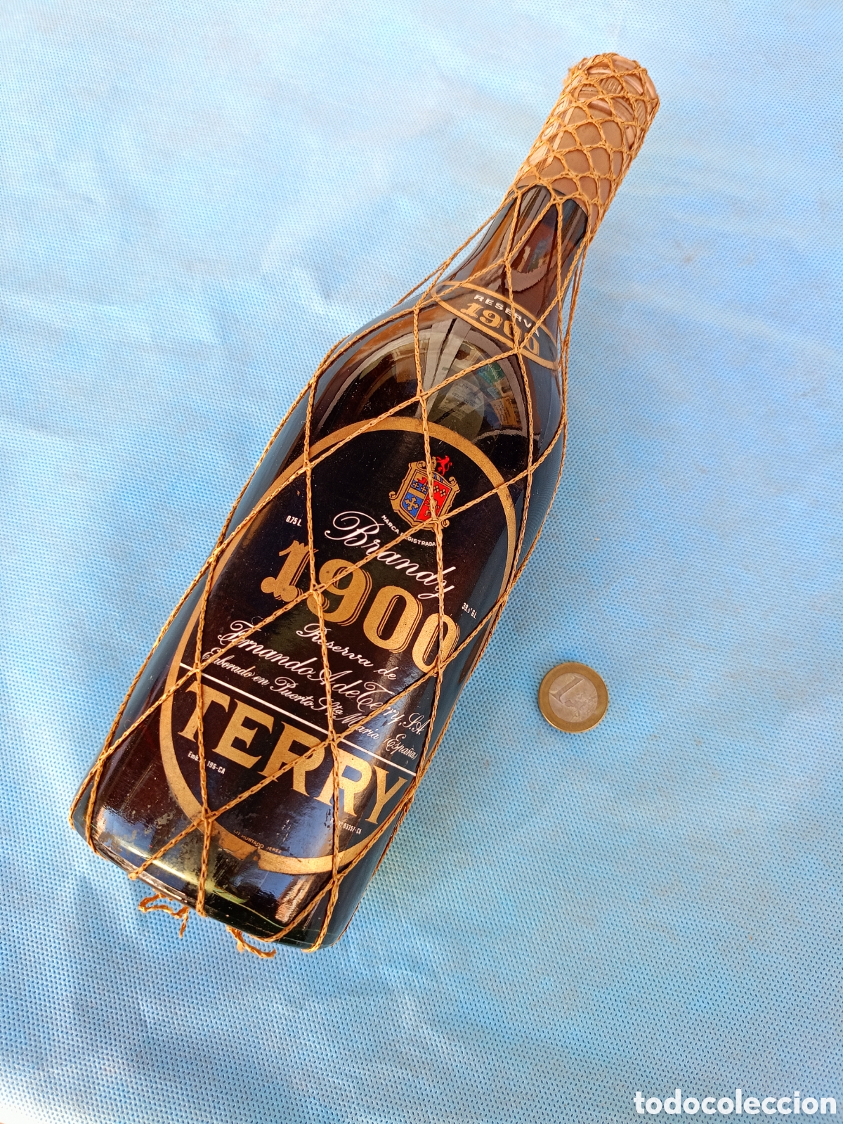Coleccionismo de vinos y licores: ANTIGUA BOTELLA BRANDY TERRY 1900 CON SELLO DE 4 PESETAS SIN ABRIR