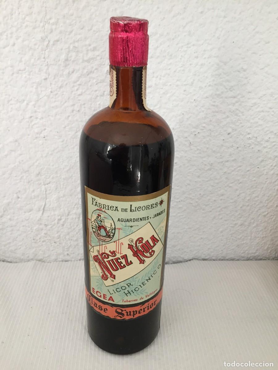 Coleccionismo de vinos y licores: Antigua Botella Licor de Nuez Kola ( Tabernes de la Valldigna - Valencia) - Clase Superior
