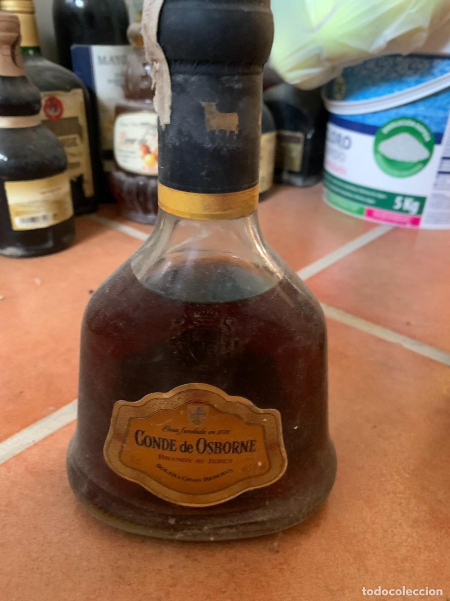 Coleccionismo de vinos y licores: BOTELLA ANTIGUA. CONDE DE OSBORNE. 20 CM. DE ALTURA.