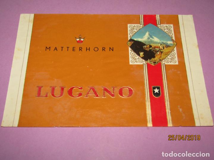 Collection cigar bands: Antigua Habilitaci&oacute;n en Litograf&iacute;a de Tabacos con LUGANO Estampados en Oro