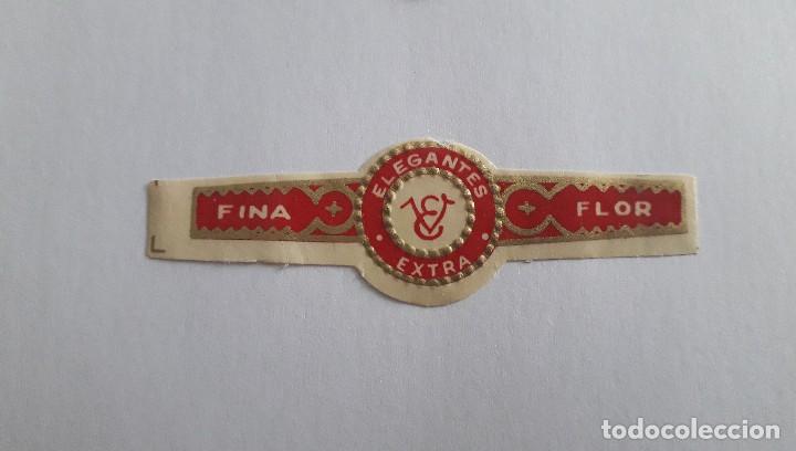 An&eacute;is de charuto de cole&ccedil;&atilde;o: vitola de puro, elegantes extra, fina flor.