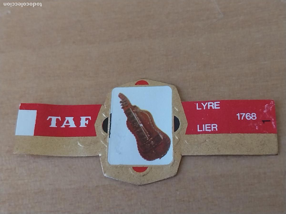 Collection cigar bands: LIRA LYRE INSTRUMENTOS CUERDA PROMO TABACO VITOLA ANTIGUA ORIGINAL 5CM
