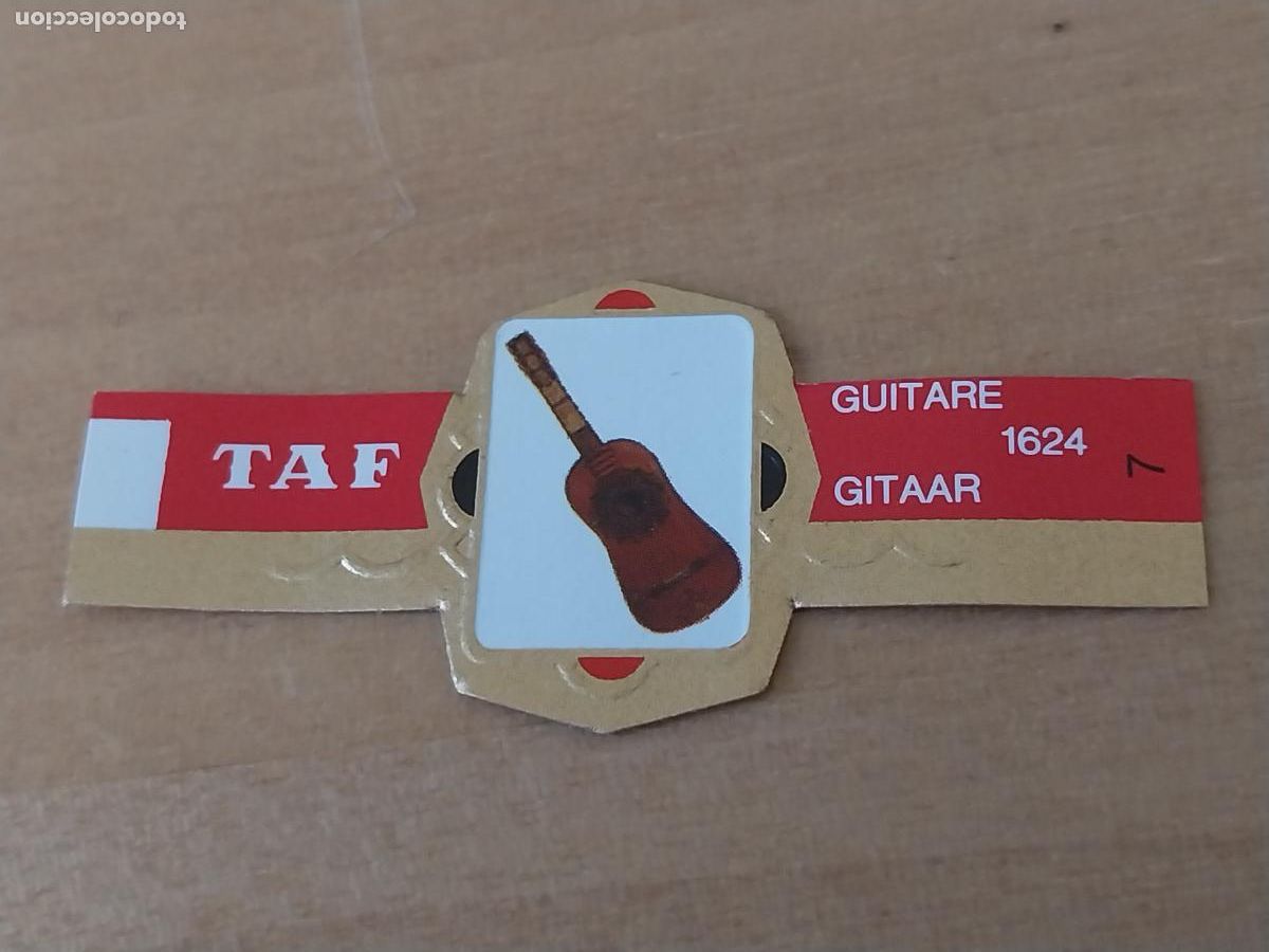 Collection cigar bands: GUITARRA GUITAR NR 7 INSTRUMENTOS CUERDA PROMO TABACO VITOLA ANTIGUA ORIGINAL 5CM